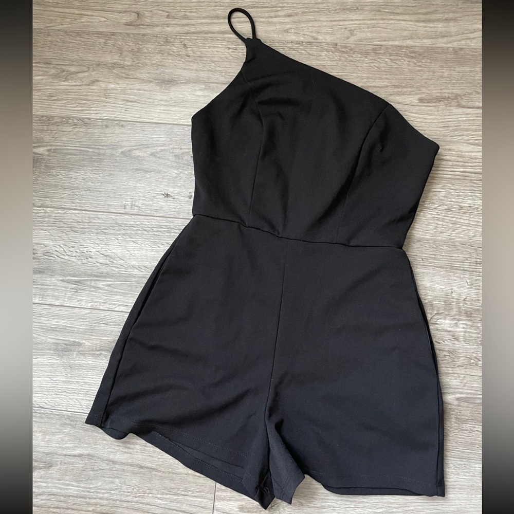 Black romper size M never worn